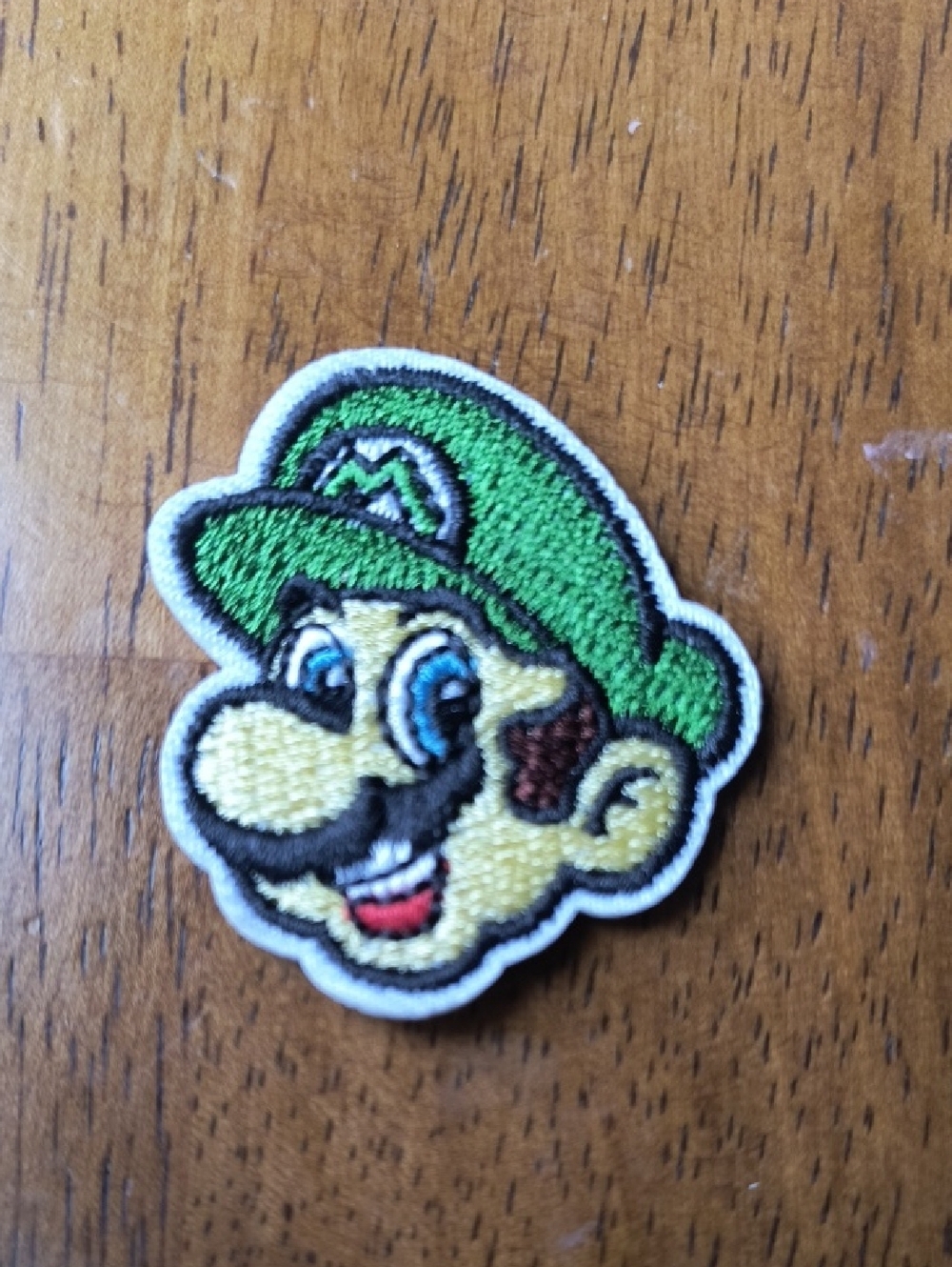 Nintendo Luigi Embroidered Patch in Green, Black, Blue, Cream